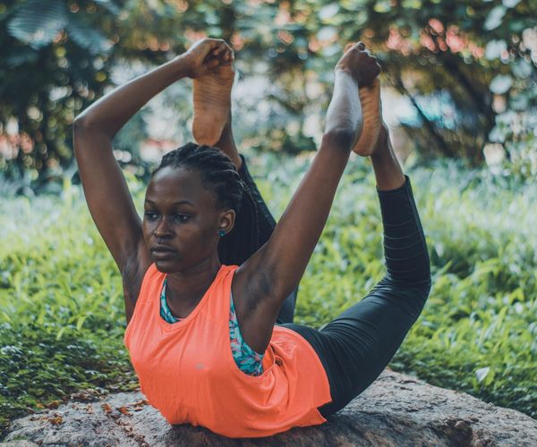 Person practicing focus exercises in a bright natural environment